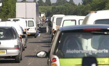 An increase in the number of vehicles on the roads could mean more scenes like this. Picture: STEVEN DENNIS