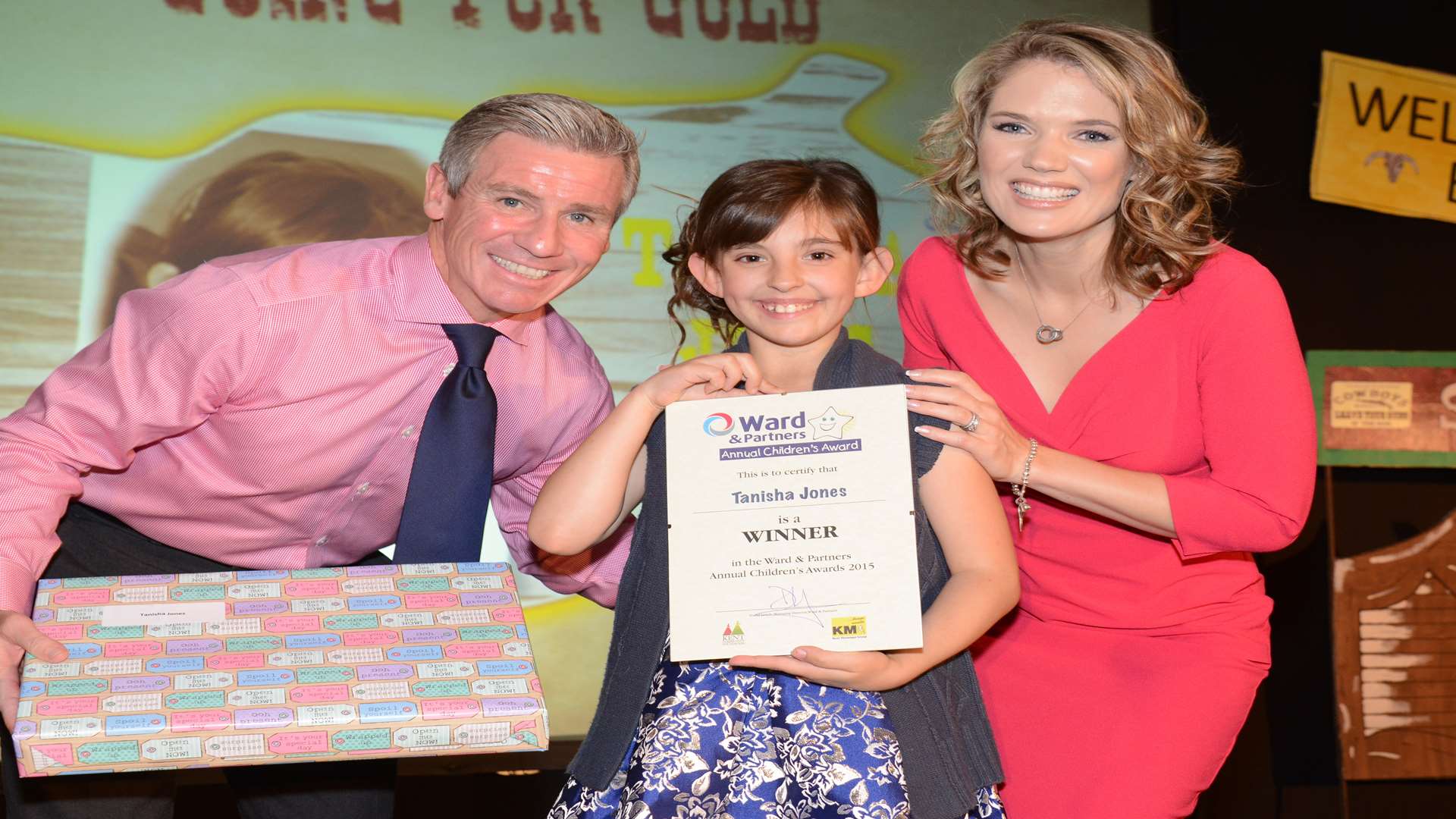 Charlotte Hawkins and Keith Lovell presenting an award to Tanisha Jones