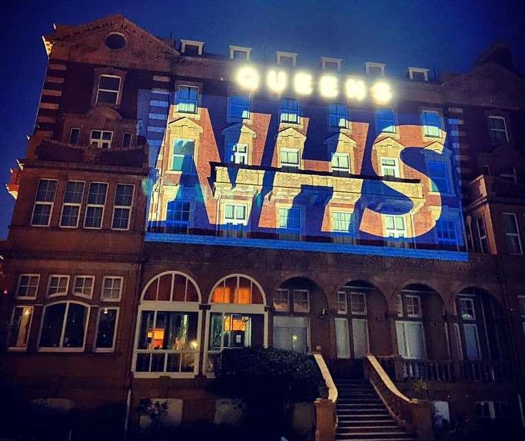 THERE FOR YOU: Queen’s Hotel lit up for the NHS