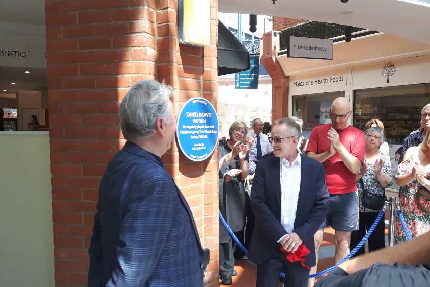 Bob Solly and Nick "Topper" Headon unveil the plaque to commemorate David Bowie's musical heritage in Maidstone.