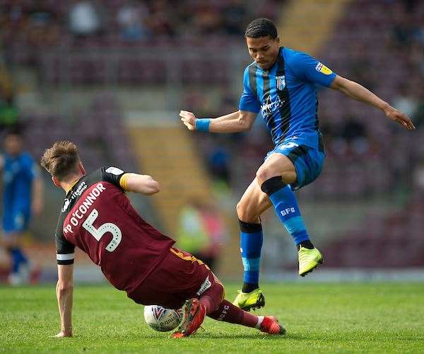 Bradley Garmston jumps over a challenge from Bradford's Paudie O’Connor Picture: Ady Kerry