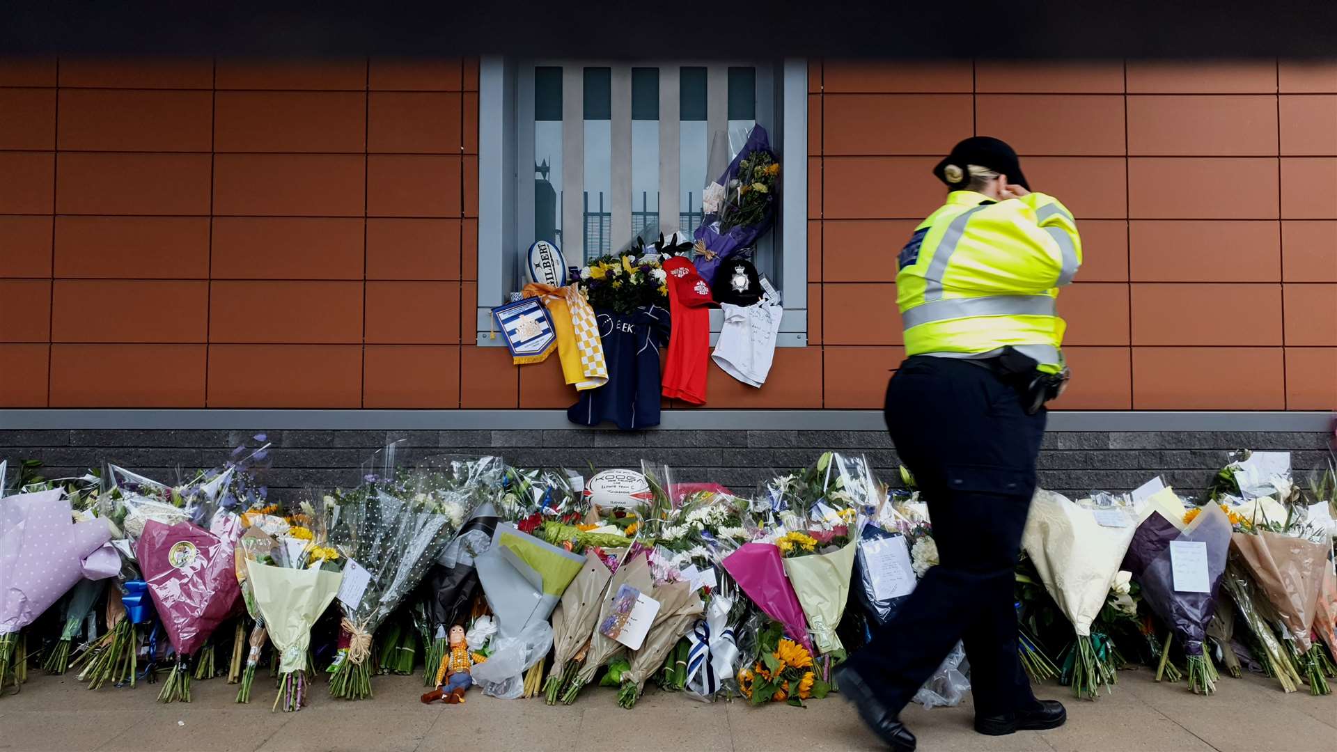 Flowers outside Croydon Custody Centre in south London where police officer Sergeant Matt Ratana was shot (Gareth Fuller/PA)