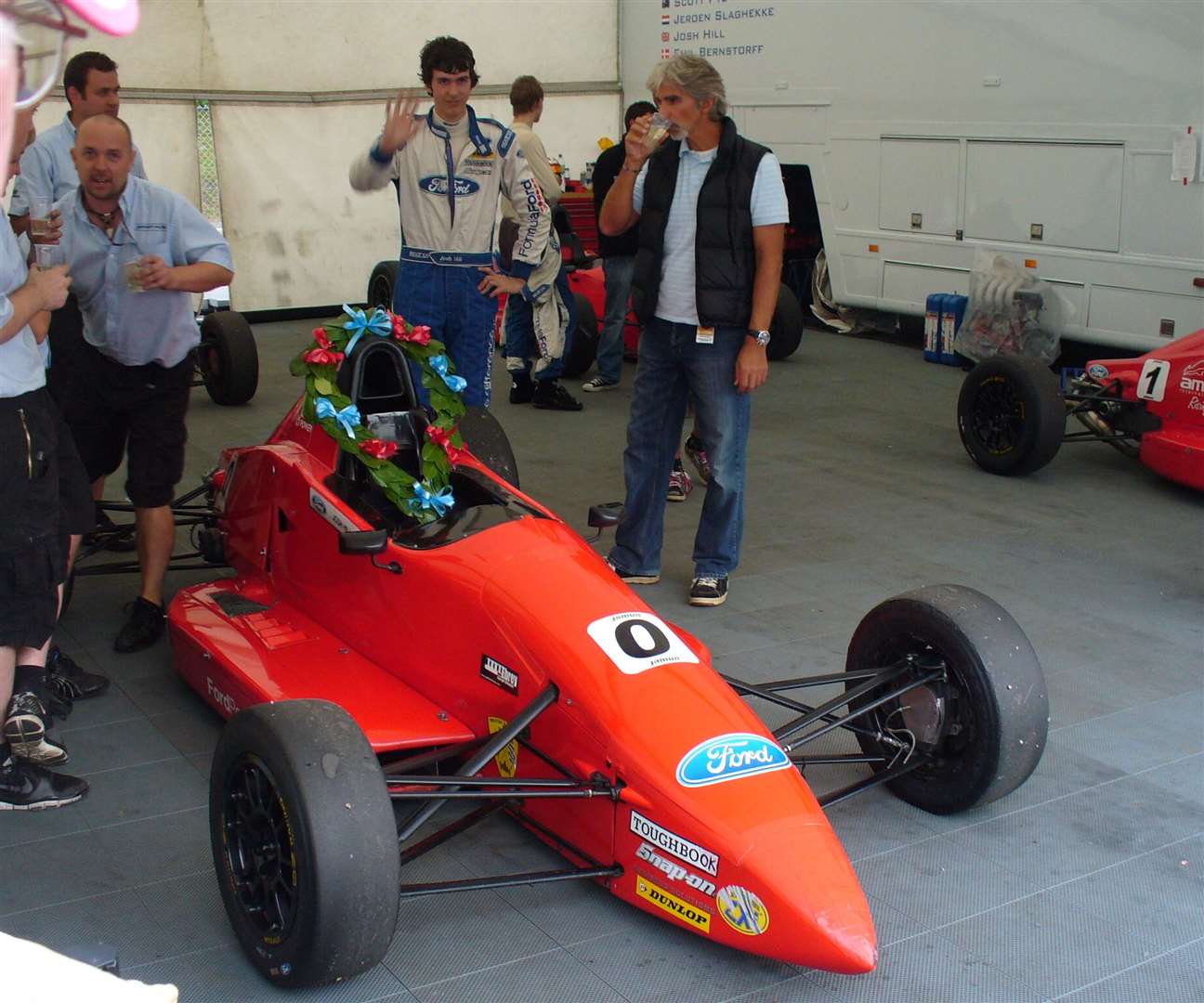 Damon celebrating Josh's Formula Ford race win at the Brands Hatch DTM event in September 2010. Josh – who retired from racing in 2013 aged 22 – drove for Rochester-based Jamun Racing during his time in the Ford series. Picture: Vic Wright