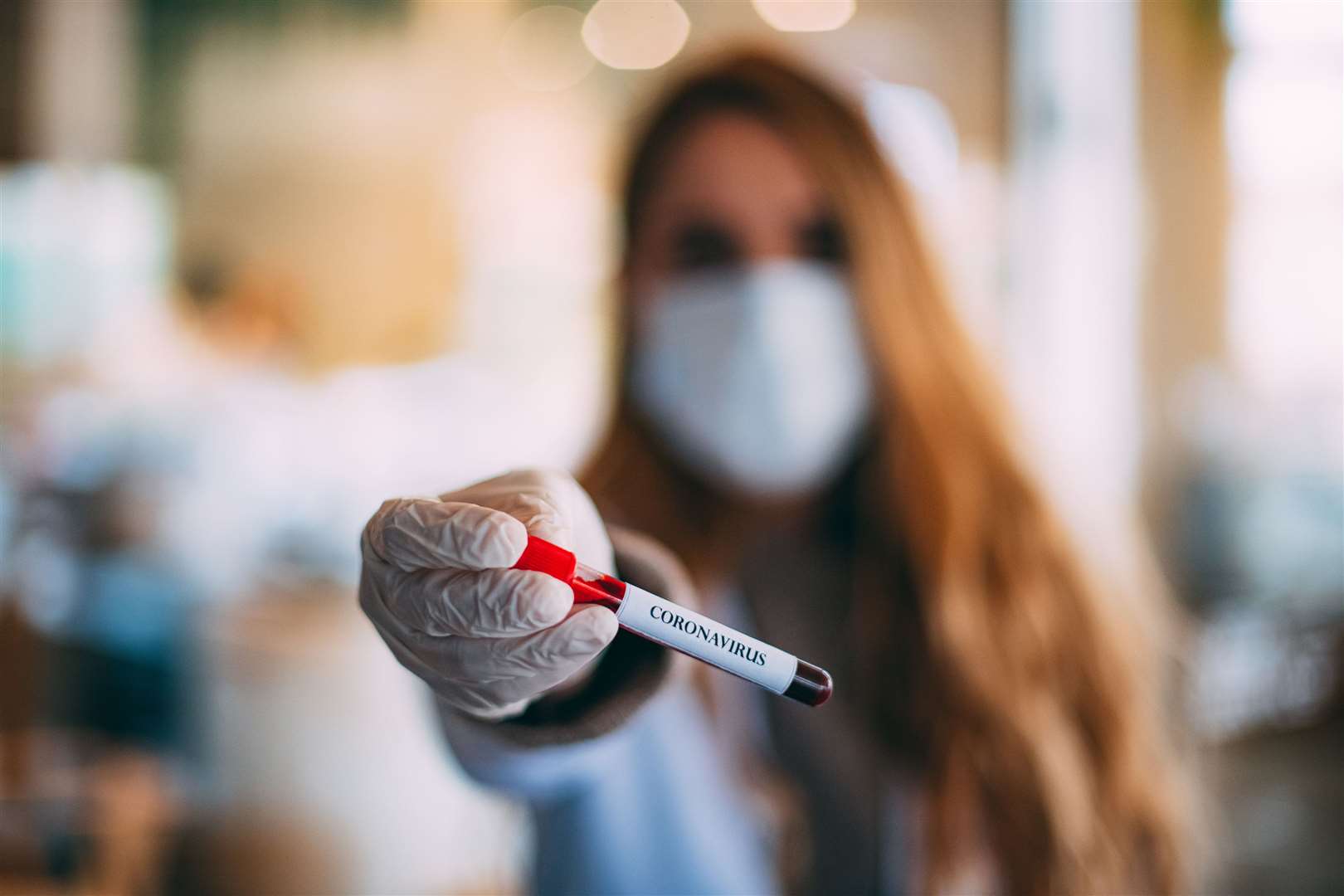 Stock photo of doctor with blood sample