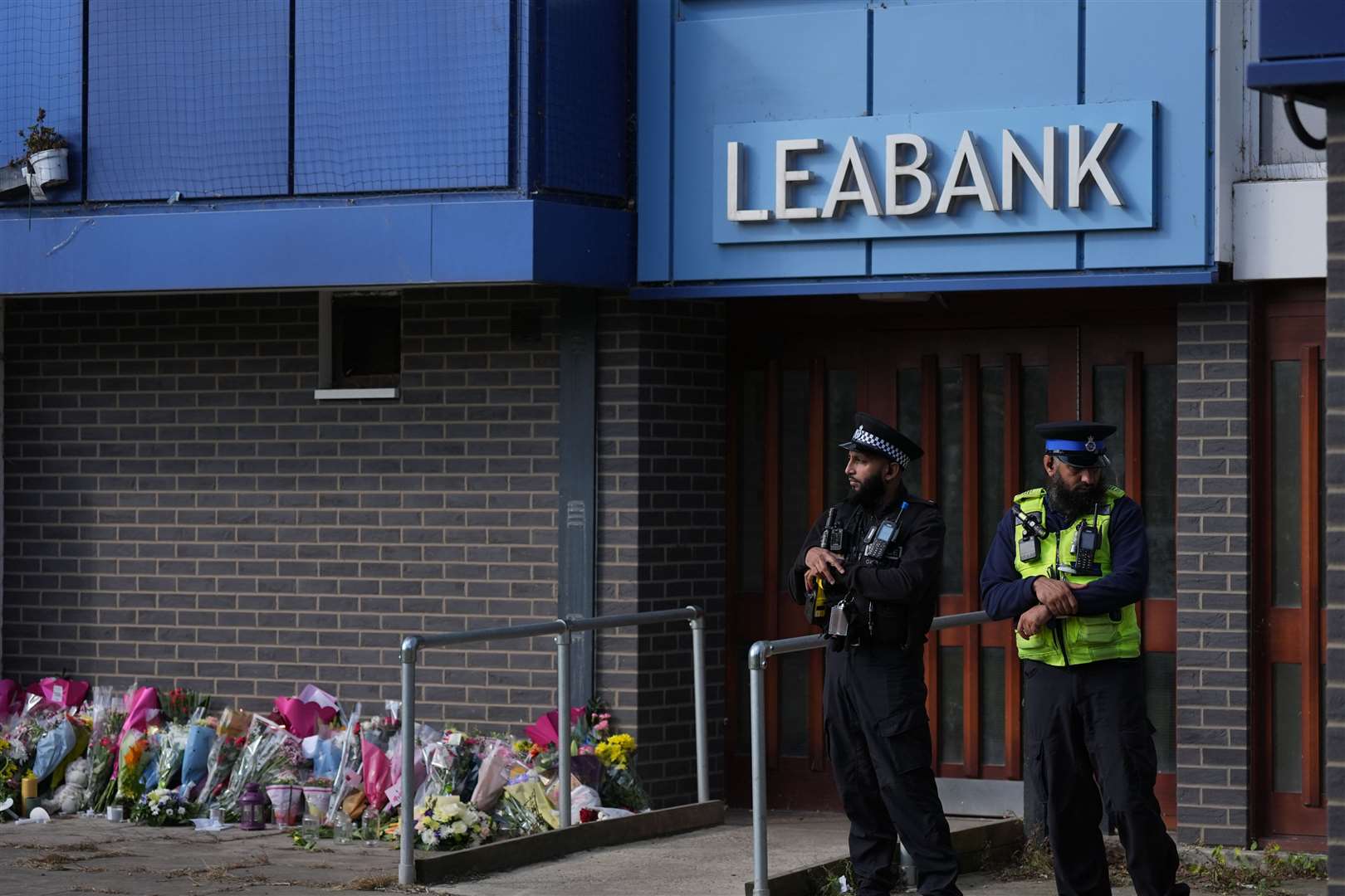 Police officers at Leabank in Luton, Bedfordshire (Jacob King/PA)