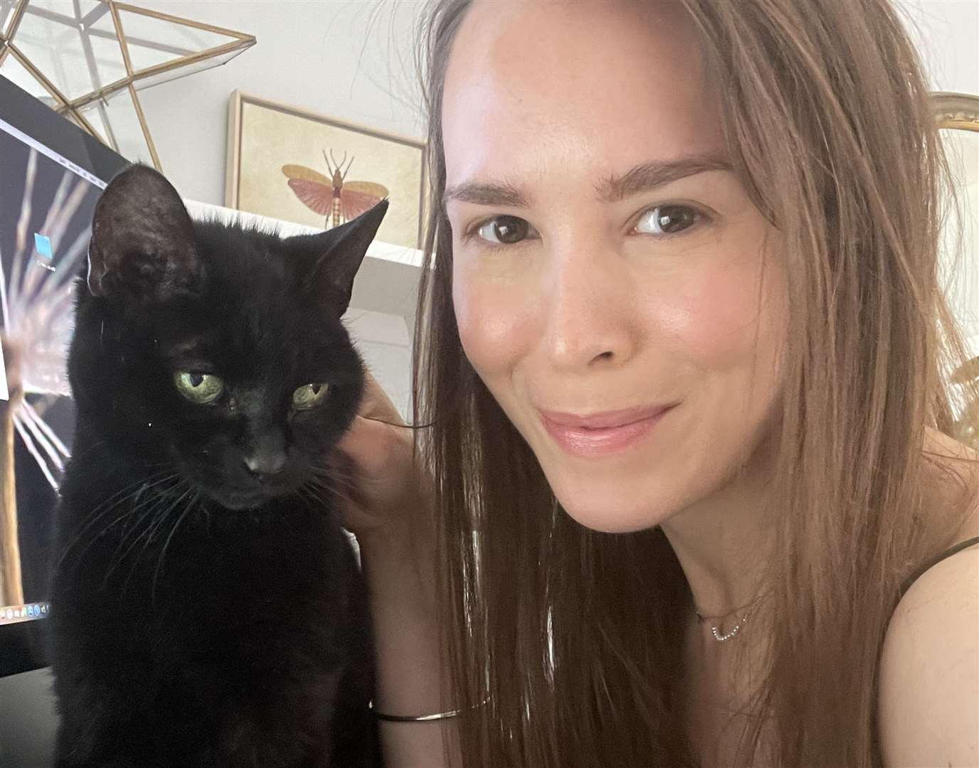 Katie Ponder pictured with her cat Poppy