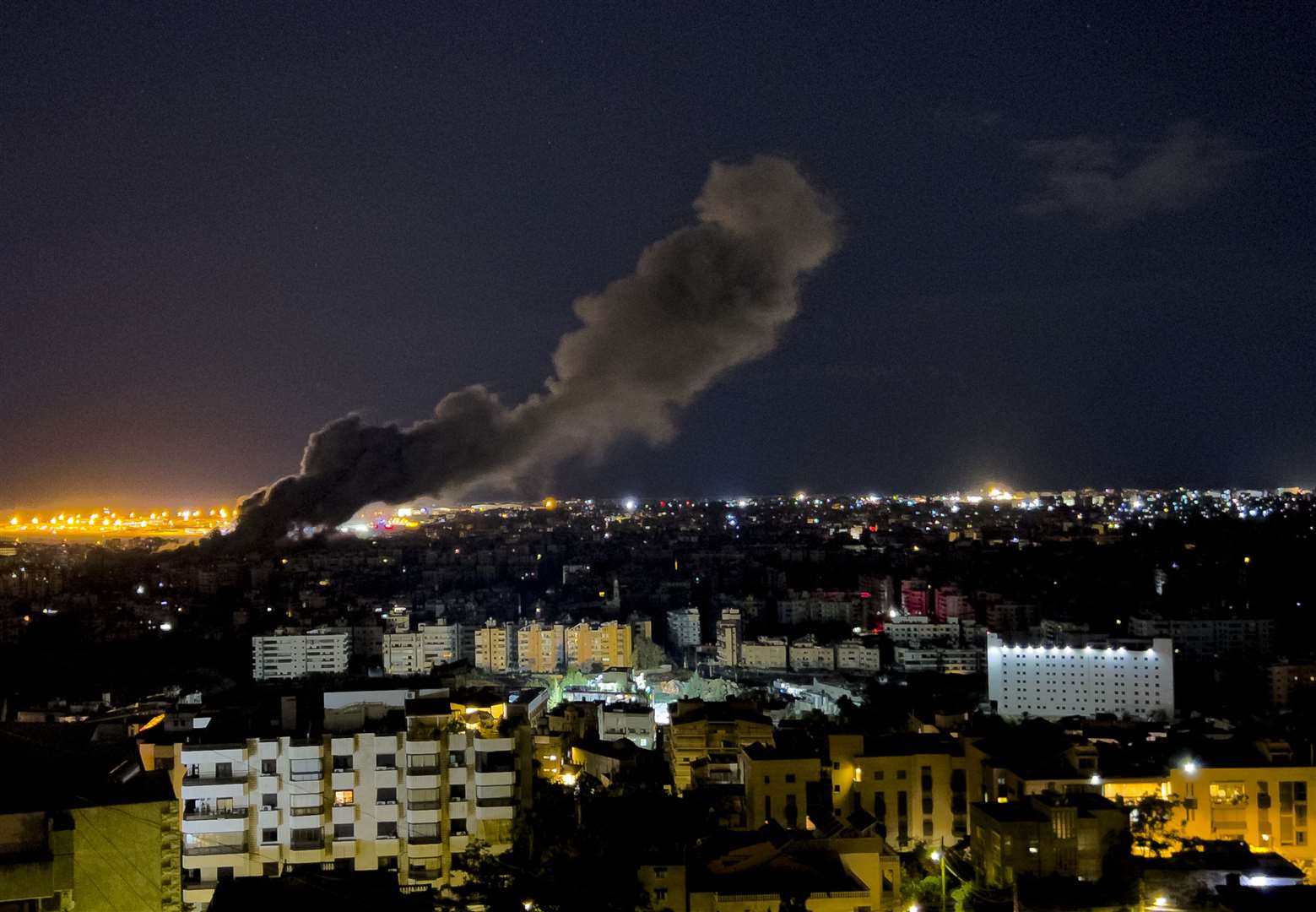 Smoke rises from an attack in Beirut, Lebanon, after Israel invaded in the early hours of Tuesday (Hussein Malla/AP)