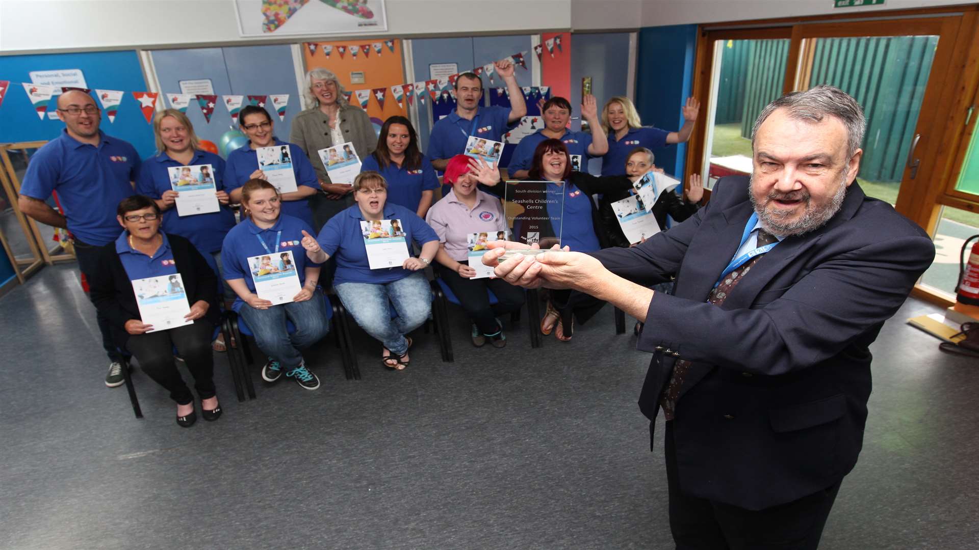 John Payne, senior manager of Seashells, with volunteers