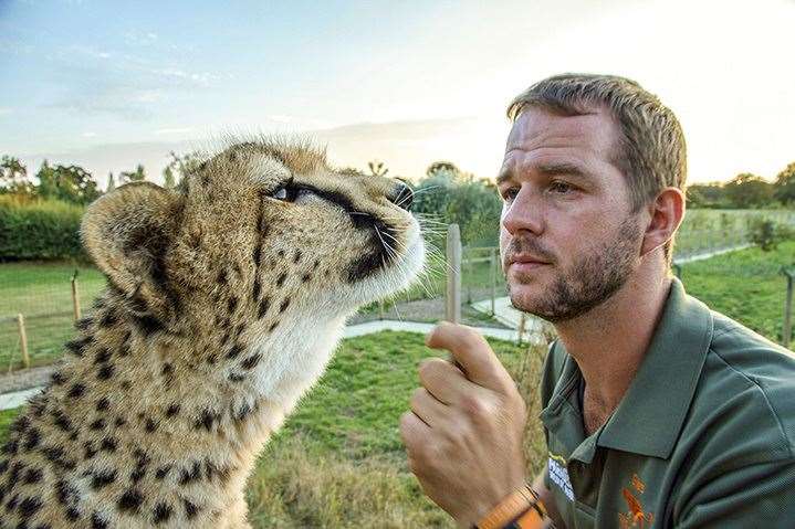 Giles Clark with Willow the Cheetah. Picture: Big Cat Sanctuary