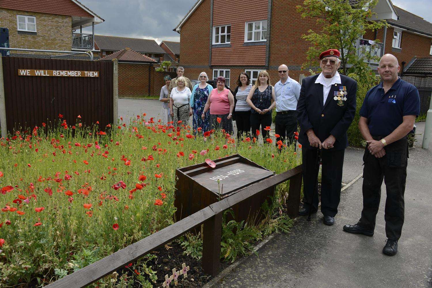 Simon Passey with resident Len Hynds who served in the Second World War and other residents