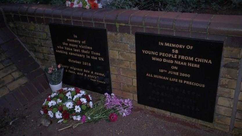 Flowers were laid at the plaques during the vigil