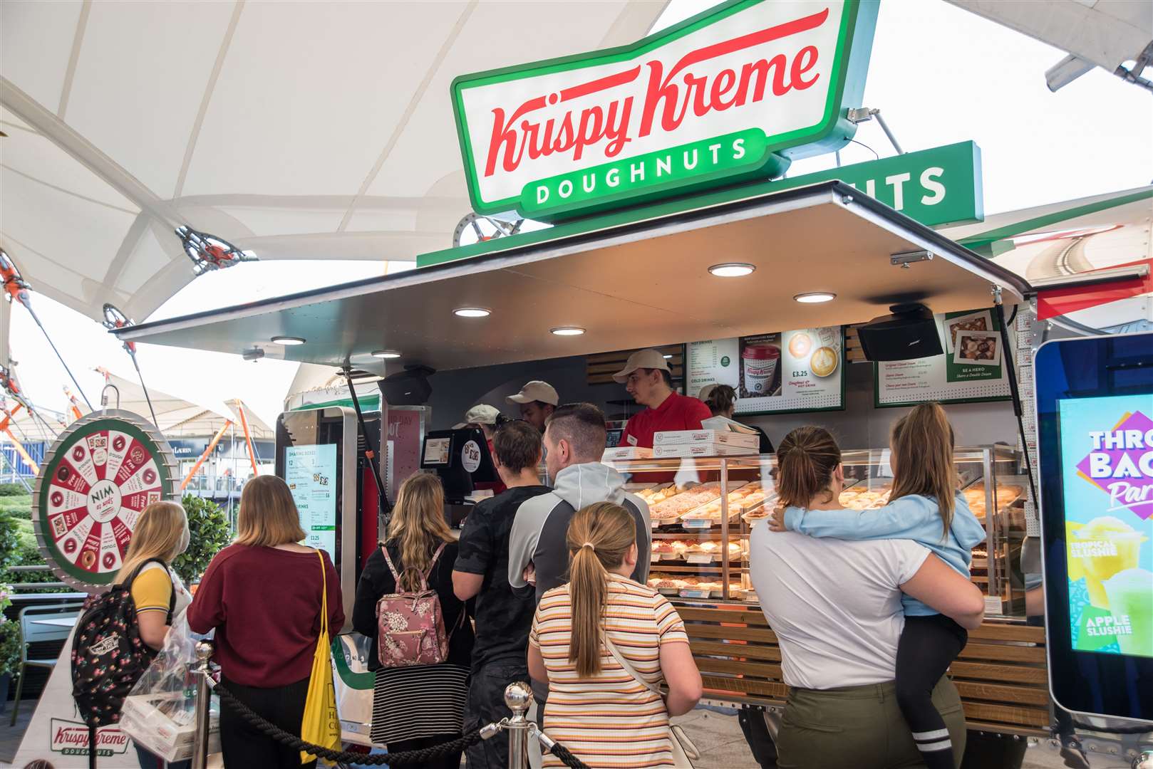 New shop openings - such as that of Krispy Kreme - has seen queues forming to be amongst the first customers