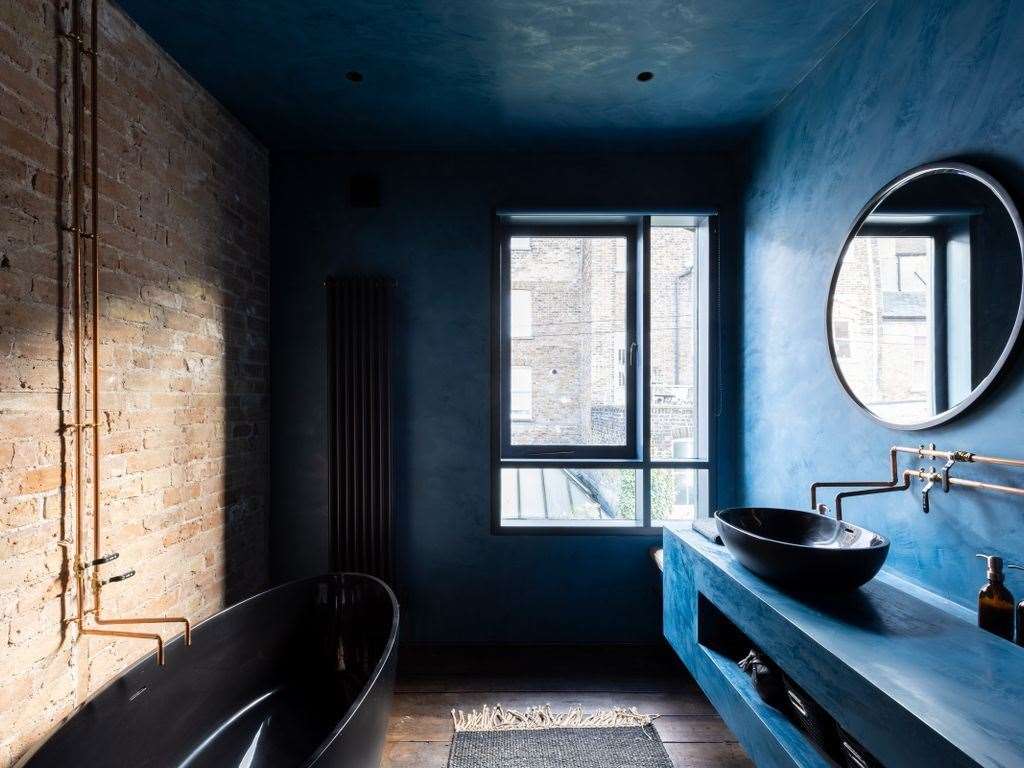 Exposed piping and brick feature throughout this pricey pad in Ramsgate. Photo: Stephen James Bishop