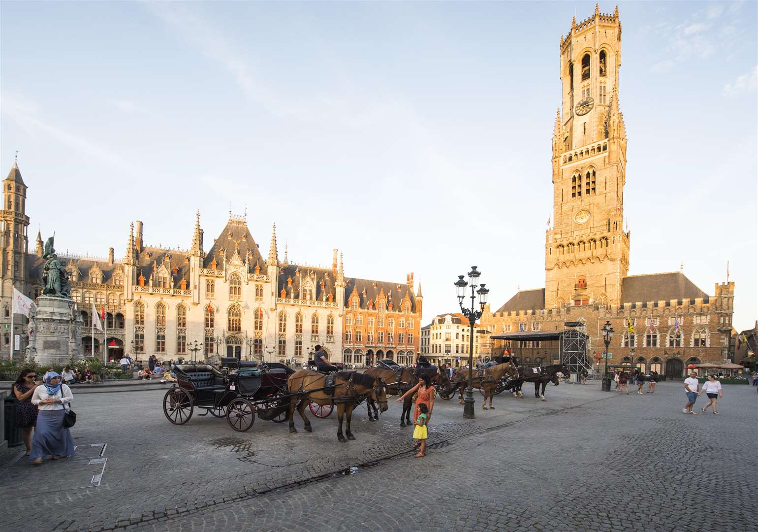 The Markt square features a 13th-century 47 bell carrillon belfry and 83 meter tower