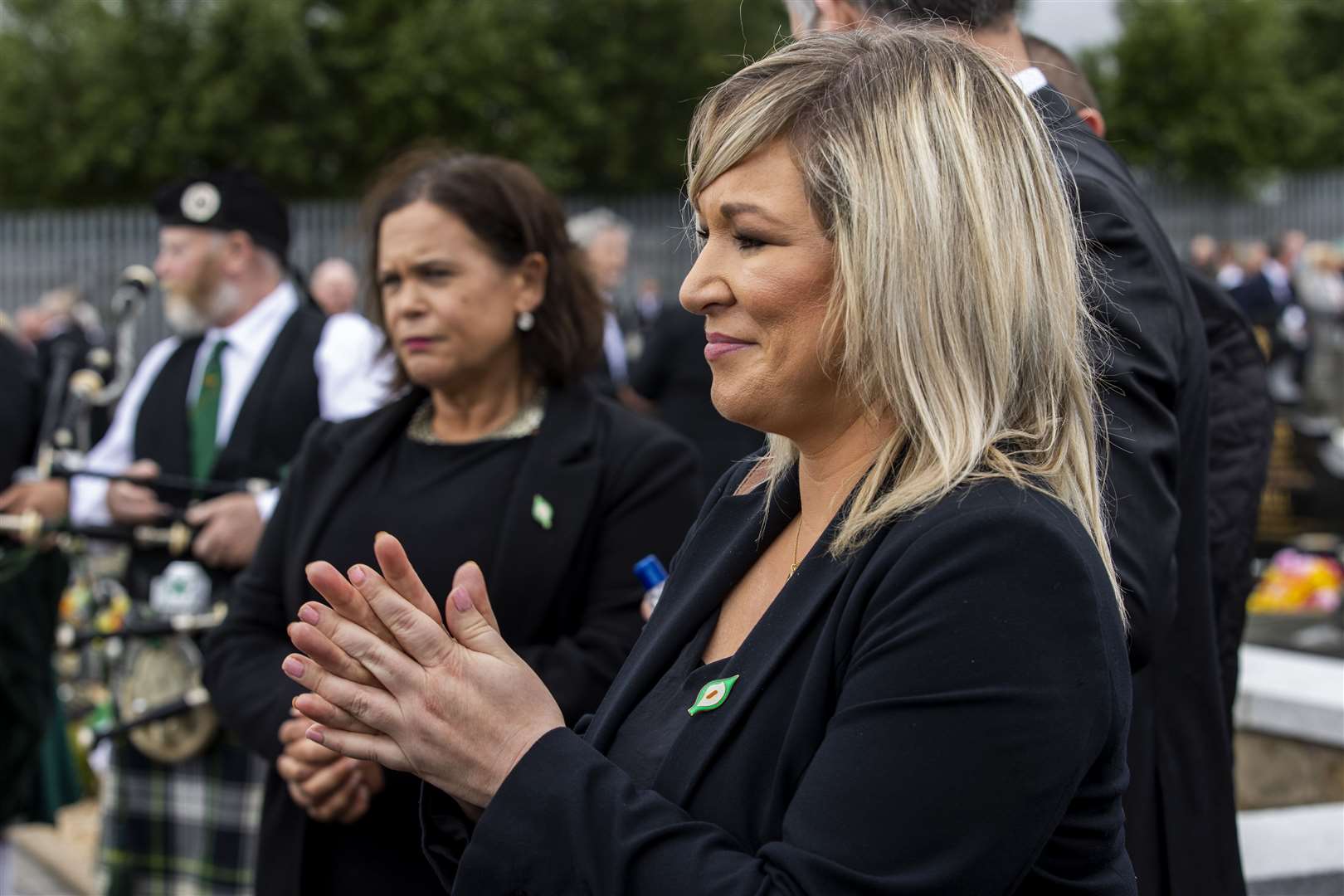 Sinn Fein leader Mary Lou McDonald with Michelle O’Neill at the funeral (Liam McBurney/PA)