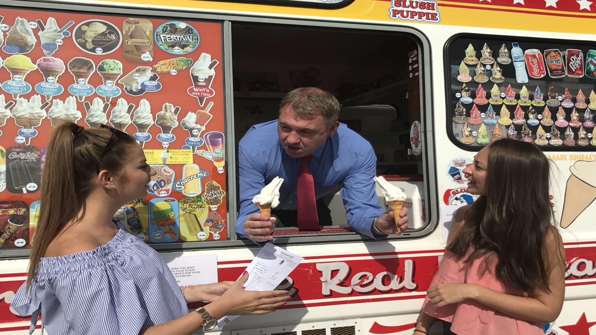 Westlands head teacher Simon Cox with, left, Libby Etheridge and Hannah Taylor