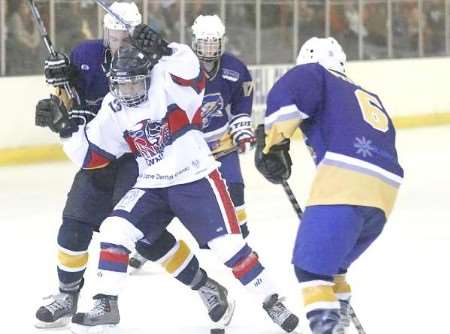 Mos' Joe Allen in the thick of it during the 10-2 victory over Romford Spitfires last Sunday in the EINHL Cup. Picture: DAVID TREVALLION