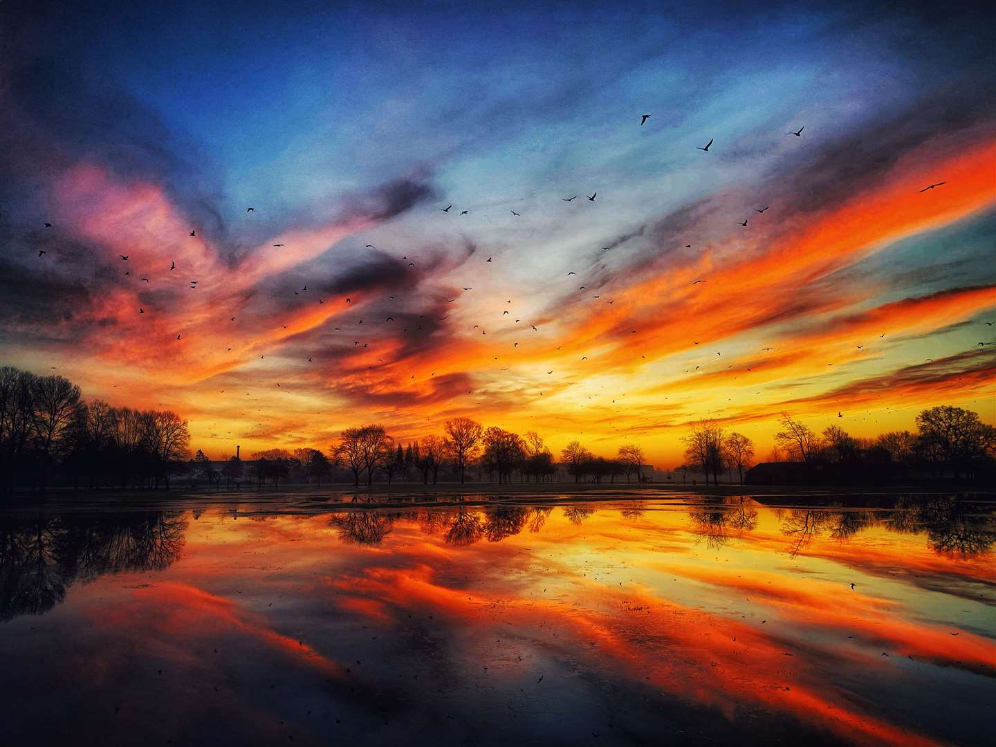 The day got off to a beautiful start, with this sunrise over West Park, Long Eaton, in Derbyshire (Scott Wilson/PA)