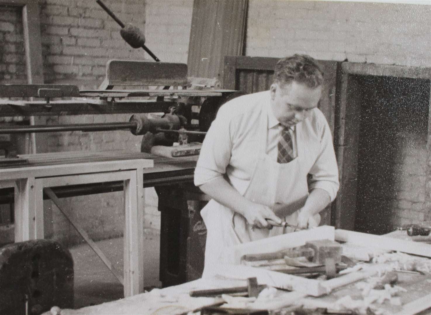 Len Cresser hard at work for Goodsell and Son, around 1960