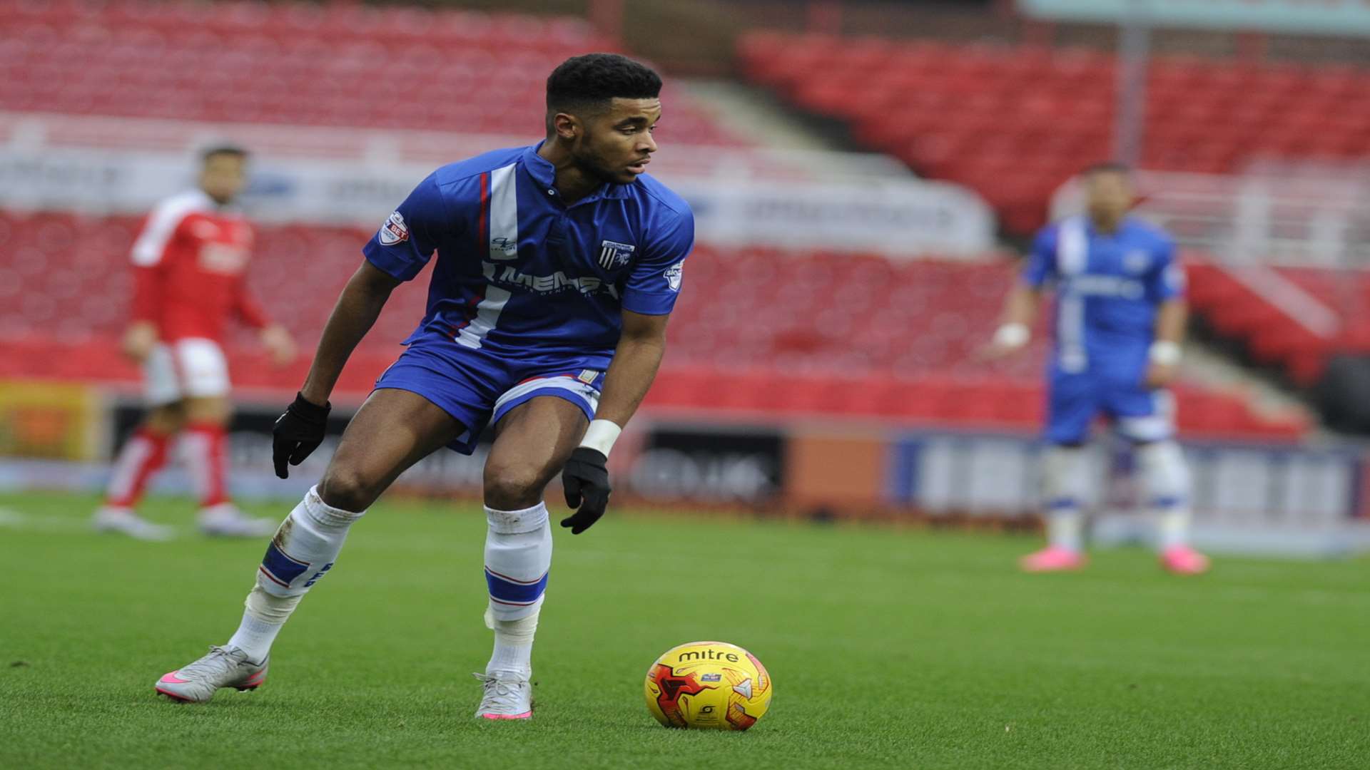 Dominic Samuel in action against Swindon Picture: Barry Goodwin