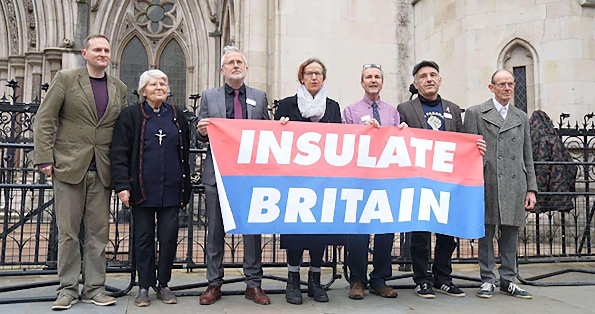 Paul Sheeky, Rev Sue Parfitt, Biff Whipster, Ruth Jarman, Stephen Pritchard, Steve Gower and Richard Ramsden outside the High Court (Elspeth Keep/PA)