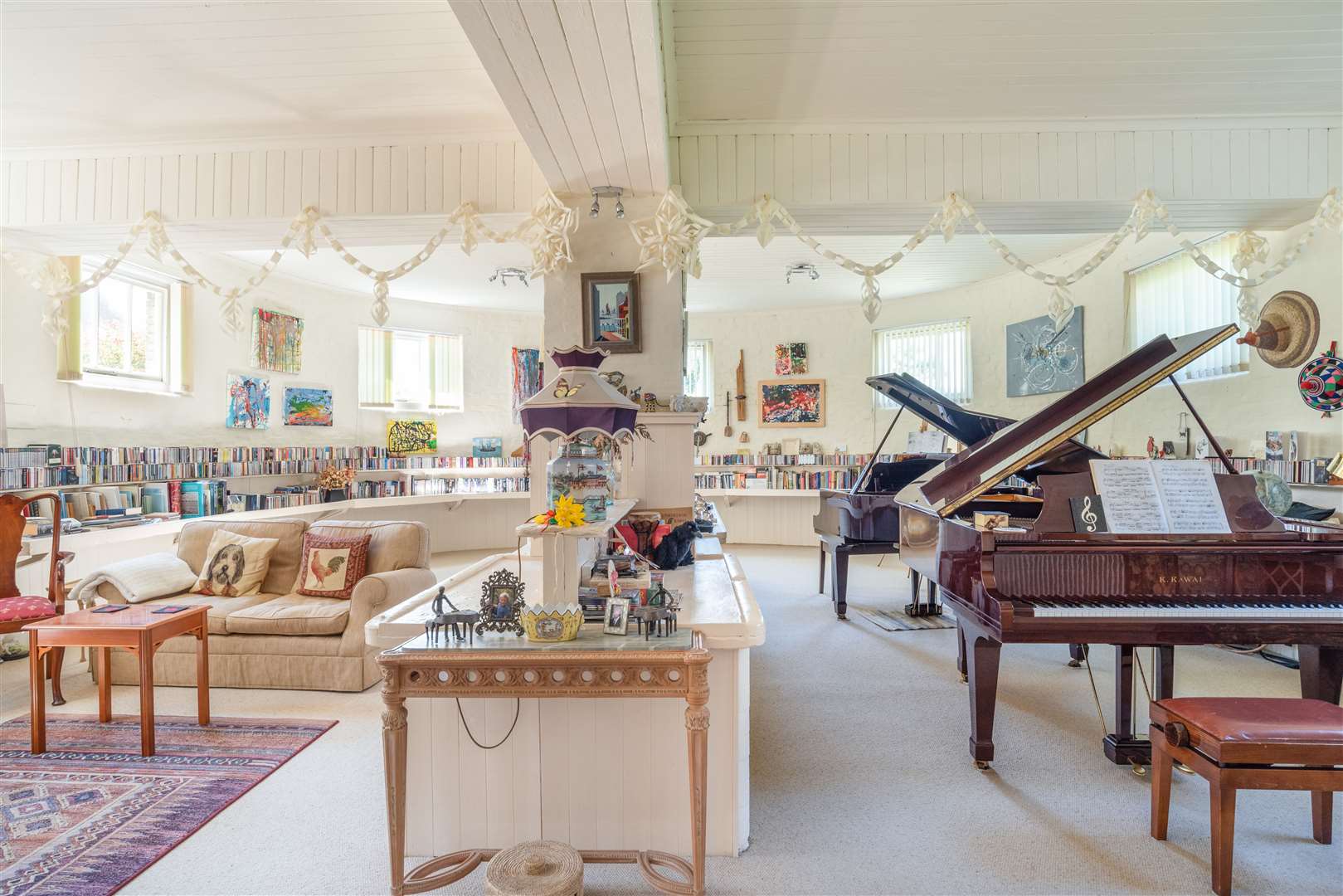 The former operating theatre is currently used as a music room with two grand pianos Picture: Strutt and Parker