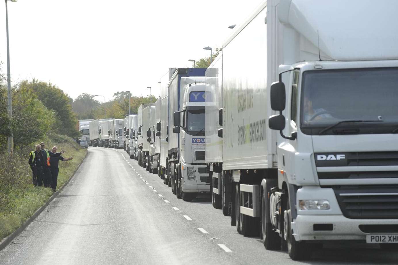 Long line of lorries queued up after the crash as it blocked entry to three major factories