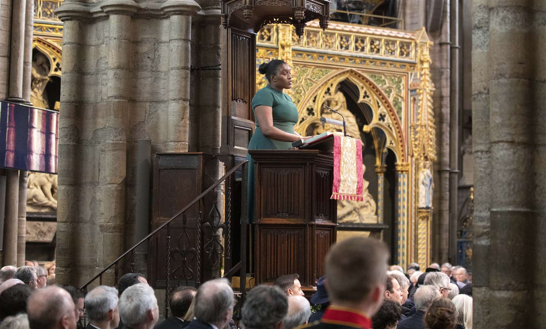 Duke of Edinburgh gold award recipient Doyin Sonibare reads her tribute (Richard Pohle/The Times/PA)