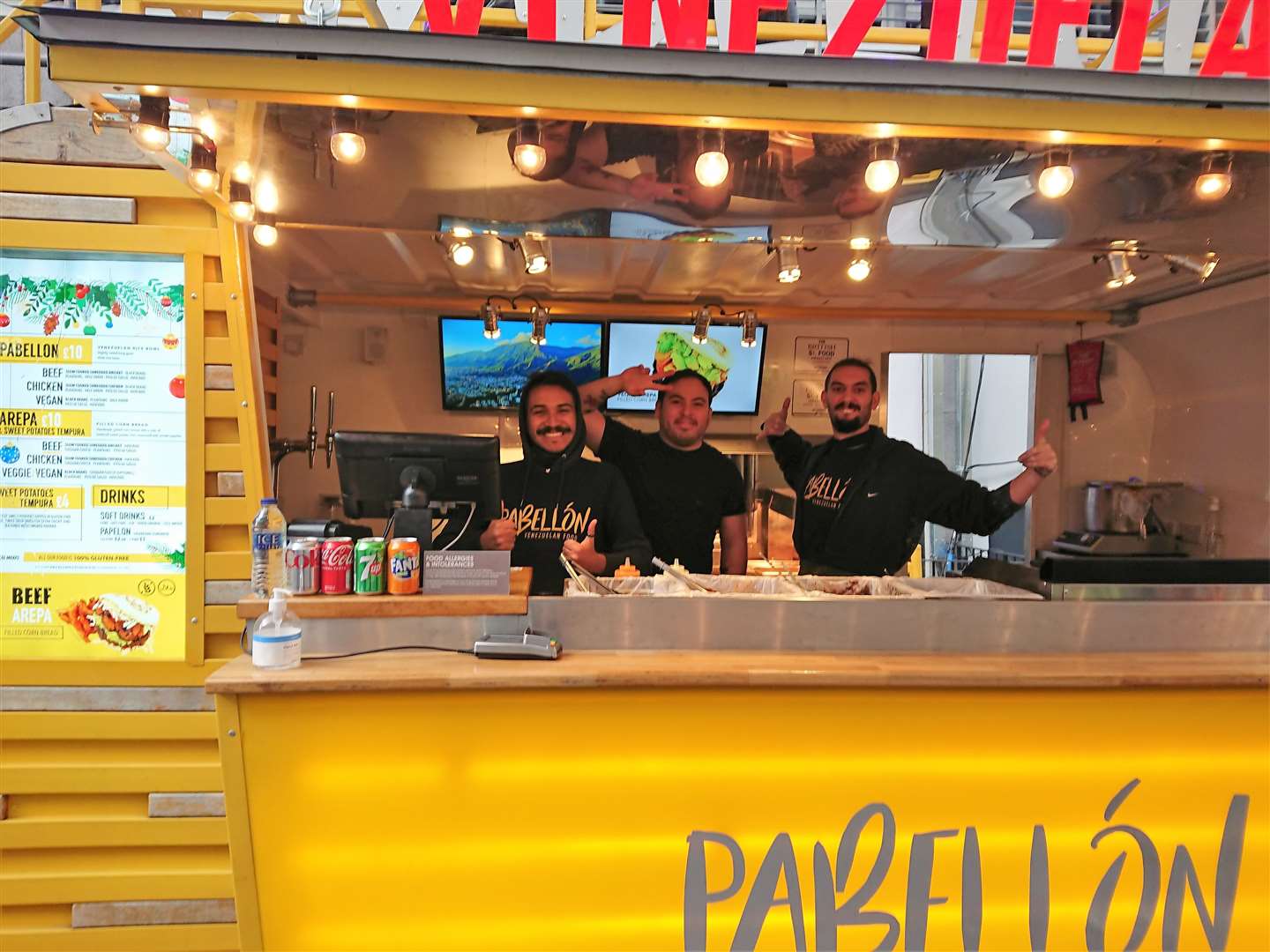 The team at Venezualan stall Pabellon