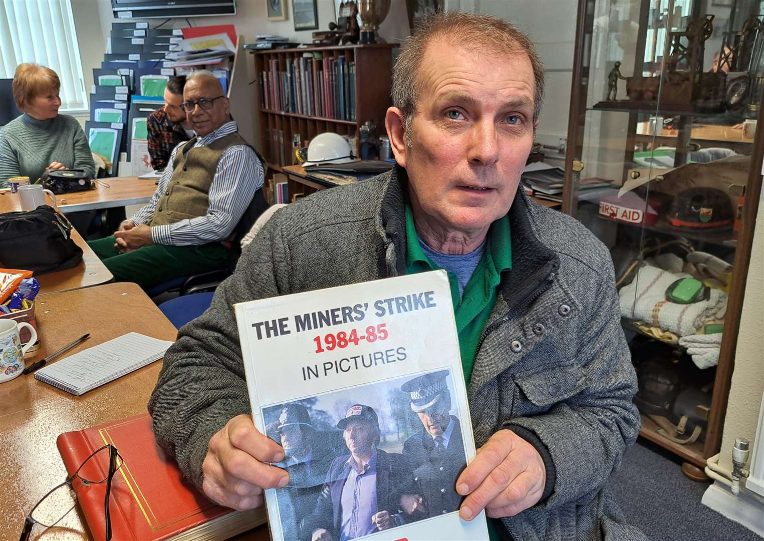 Ex-miner Shaun Parry with a book on the strike