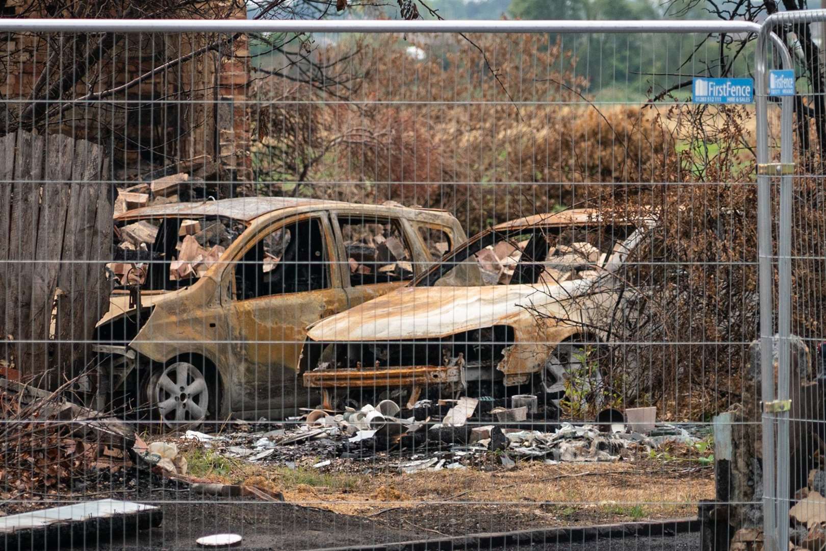 Fire-damaged cars in Wennington (Dominic Lipinski/PA)