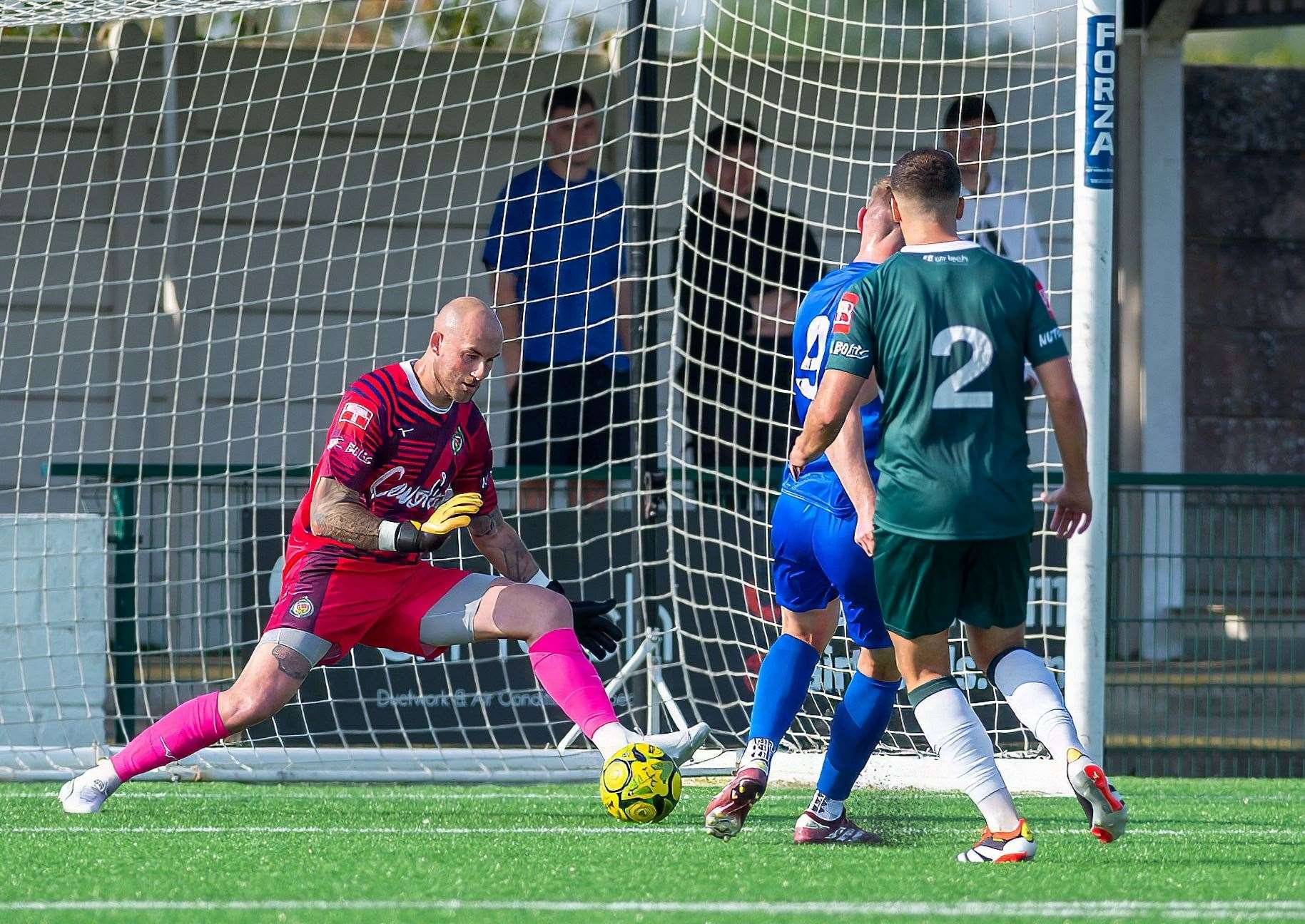 Ashford keeper Mitchell Beeney is called into action as Hartley Wintney go close at the weekend Picture: Ian Scammell