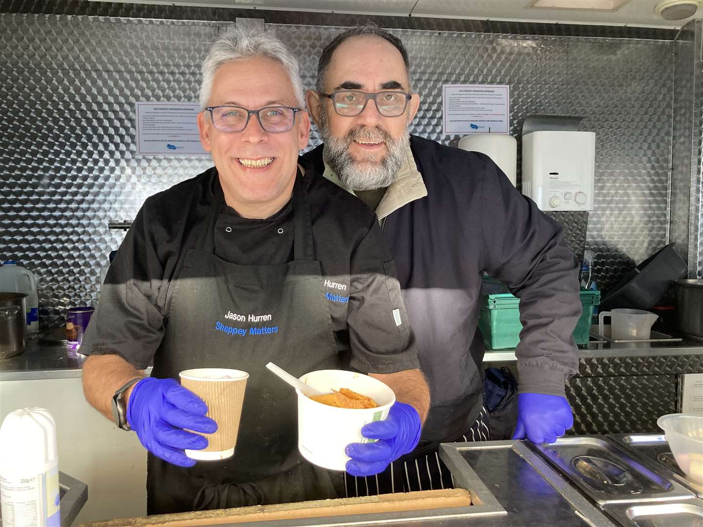 Community chefs Jason Hurren, left, and Mike Spackman from Sheppey Matters handed out free hot chocolate and bowls of chilli