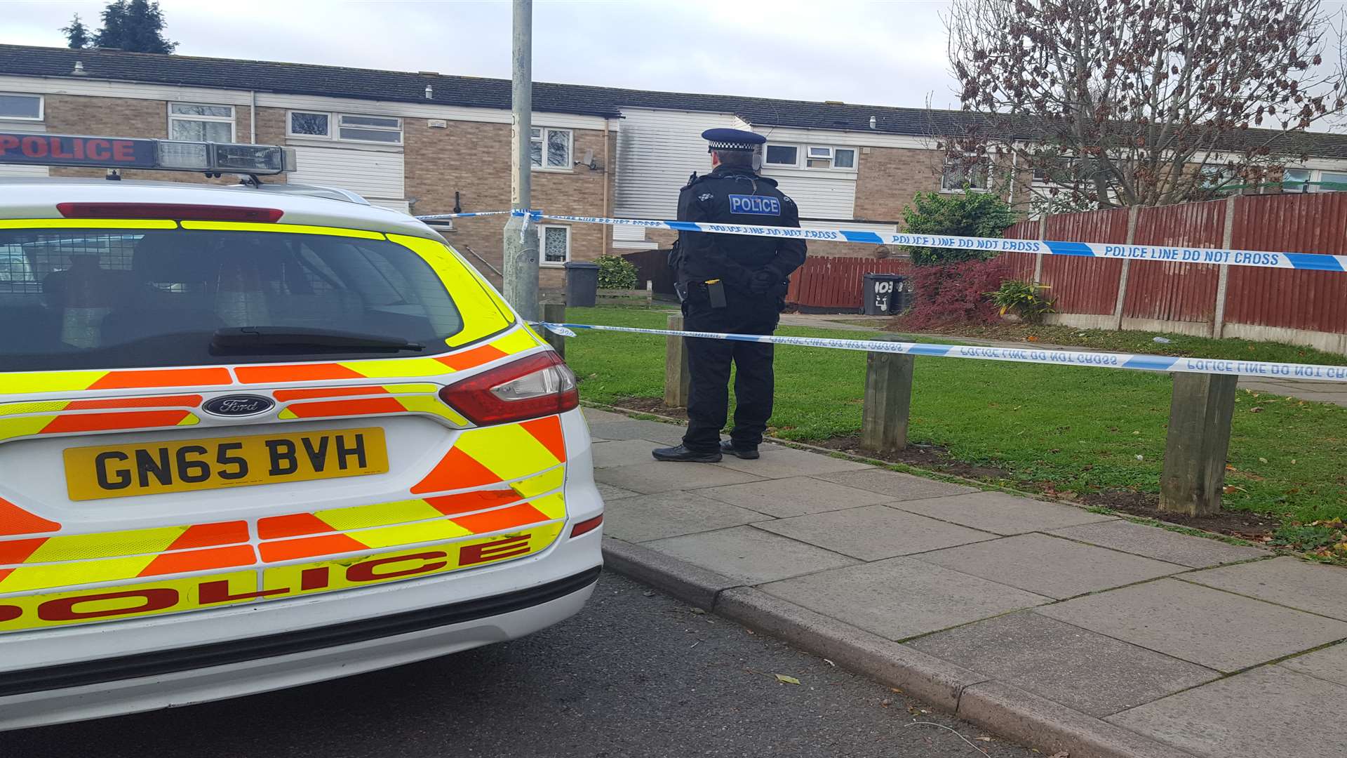 A row of houses in Downs Road was taped off by police