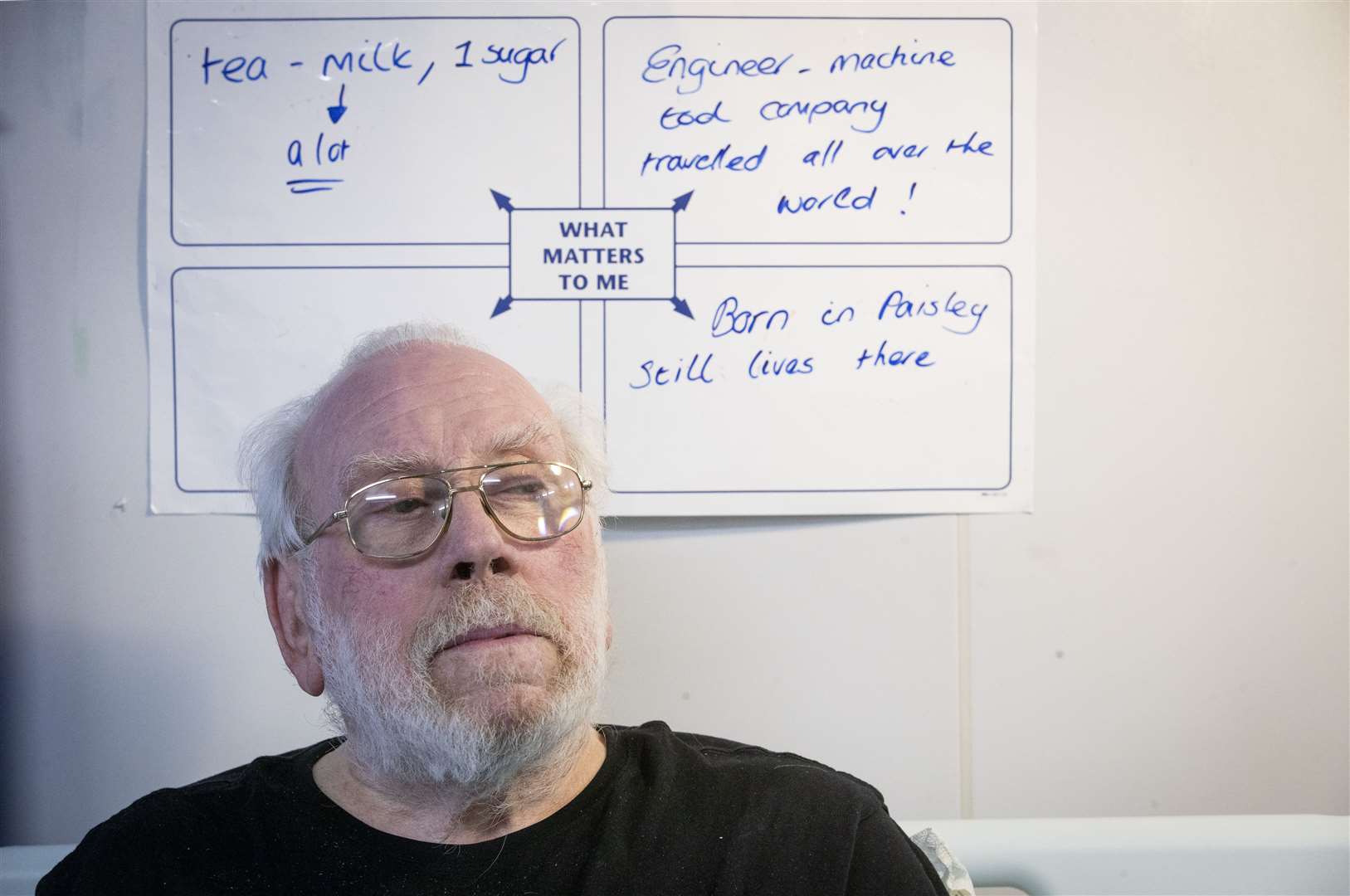 Jim Cullen, 80, awaits treatment on his bed in the Royal Alexandra Hospital (Jane Barlow/PA)