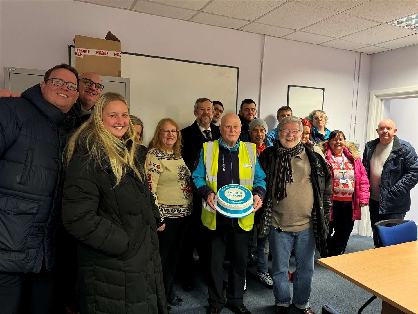 Dougie Calder with current and former colleagues at Margate station as he celebrates 55 years working in the rail industry. Picture: Southeastern