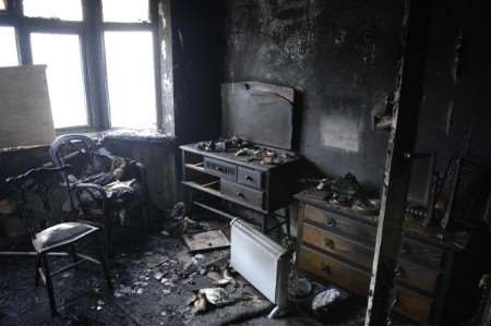 The fire damaged bungalow in Augustine Road, St Paul's Cray.