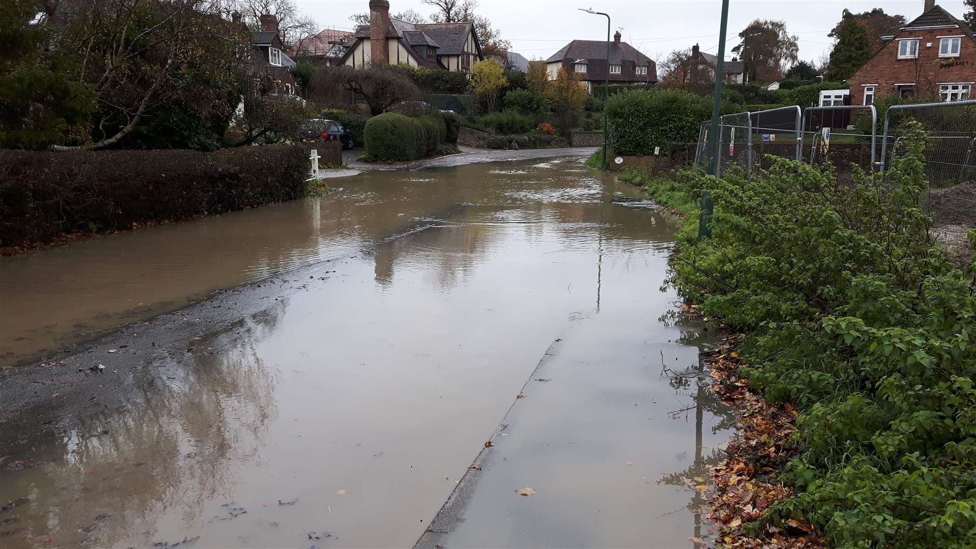 The Roundwell Park development site in Bearsted is behind the Heras fencing to the right