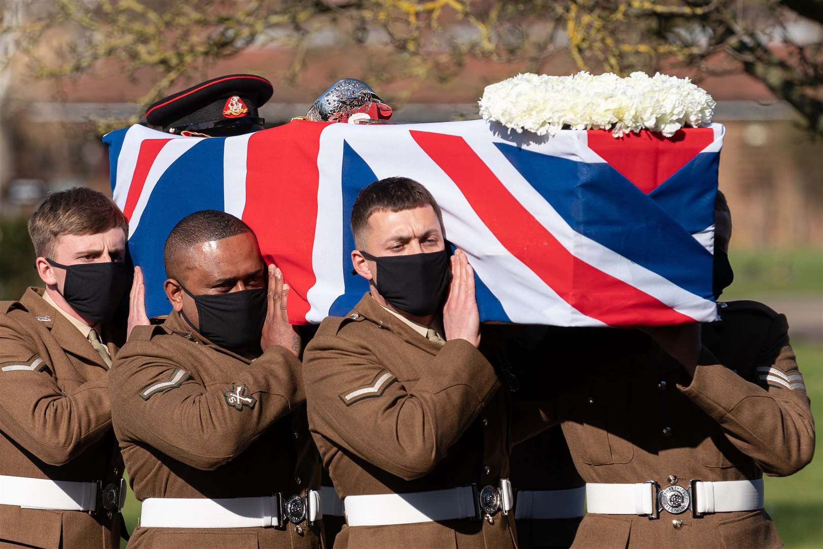 Sir Tom’s coffin was draped in a Union flag (Joe Giddens/PA)