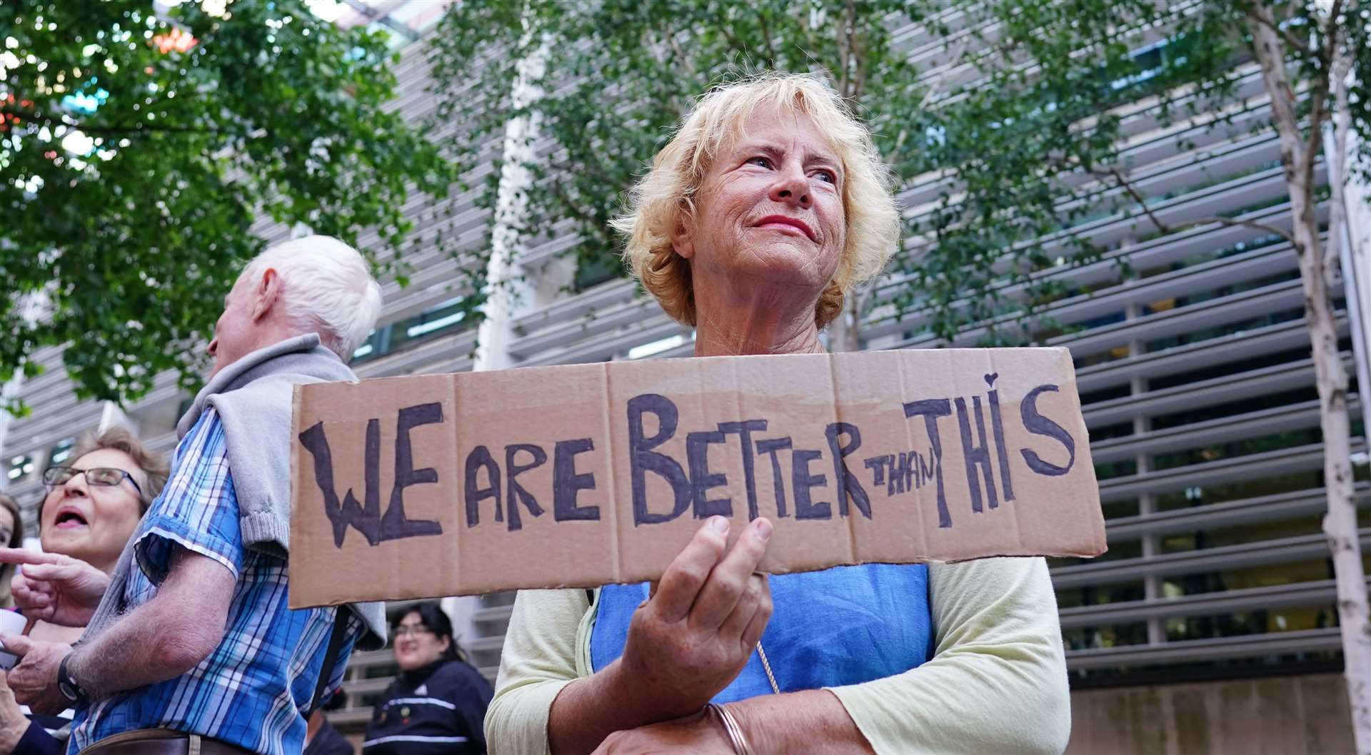 Demonstrators protest outside the Home Office in London against plans to send migrants to Rwanda (Dominic Lipinski/PA)