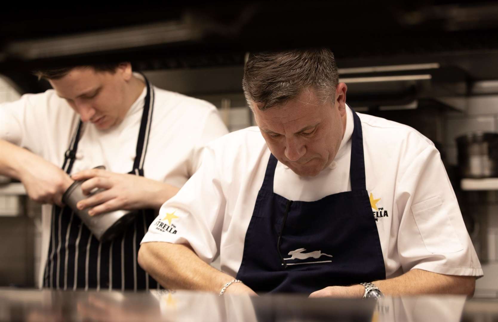 Chris at work in the kitchen with the team