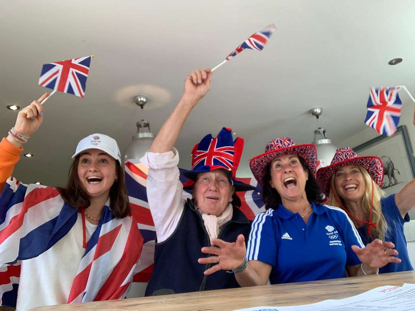 Ella McEwen, left, with her parents, Bobby and Ali McEwen, and family friend Lucy Sangster, right (Ella McEwen)