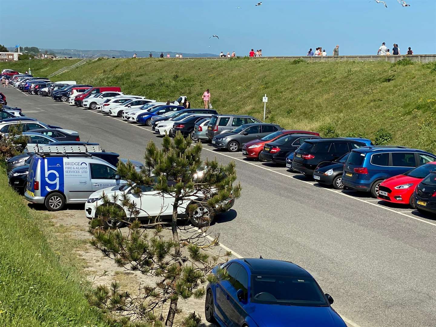 Dymchurch beach is incredibly popular with tourists in the summer months, with its main car park quickly filling up. Picture: Barry Goodwin