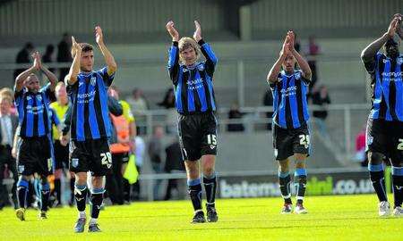 Gills players clap the travelling fans at Morecambe