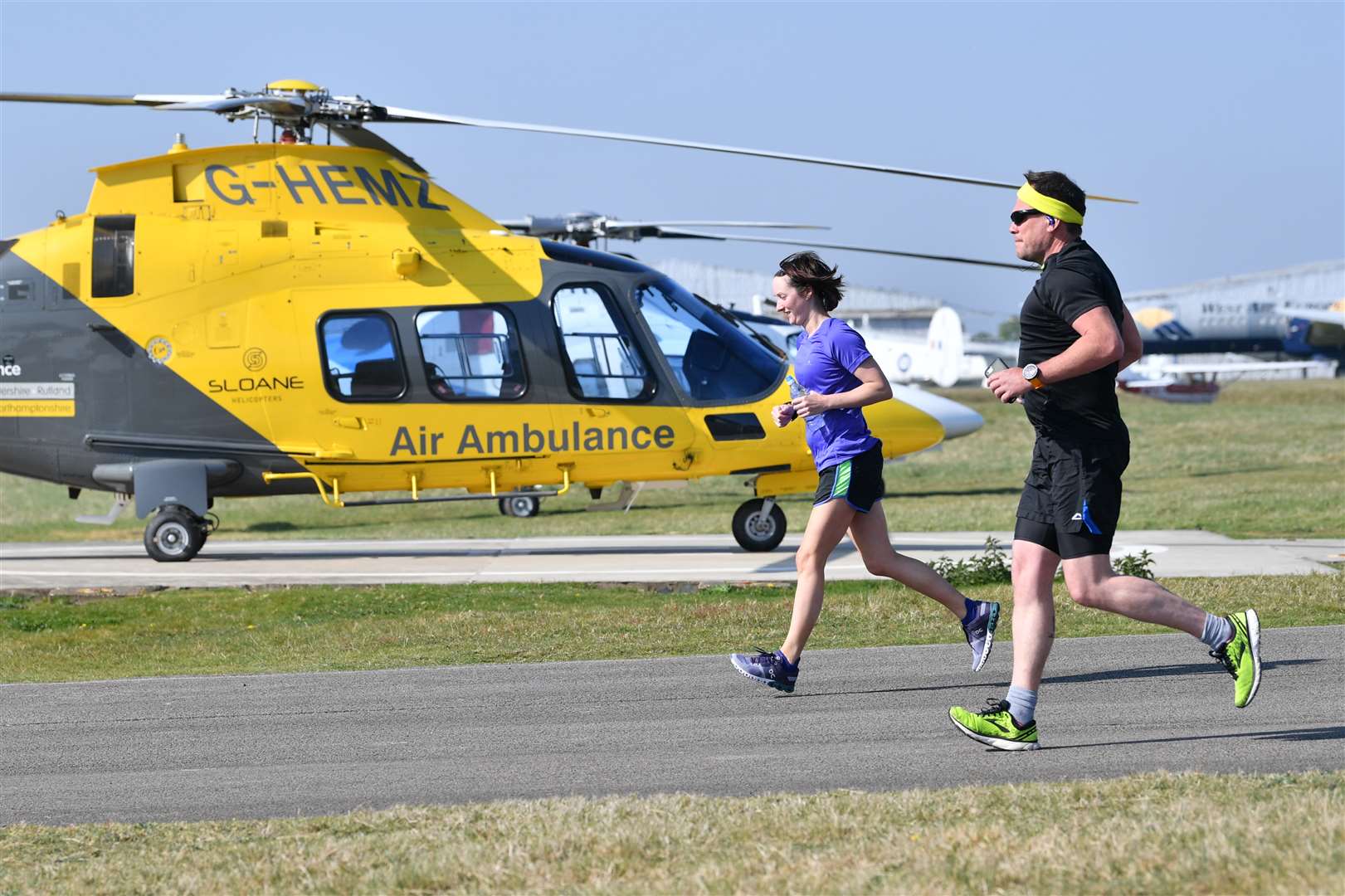 Meanwhile, critical care paramedic Sophie Birt and Dr Stuart Maitland-Knibb from Warwickshire & Northamptonshire Air Ambulance took part in a marathon around Coventry airport (Ben Birchall/PA)