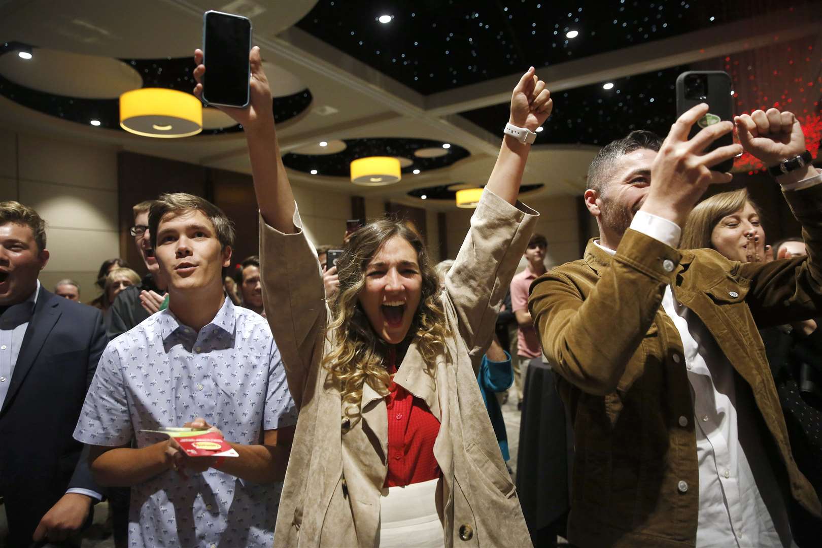 Supporters of Republican Beth Van Duyne reacts to Texas’s 24th U.S. Congressional District candidate as she delivered her acceptance speech in Hurst, Texas (The Dallas Morning News via AP/Tom Fox)