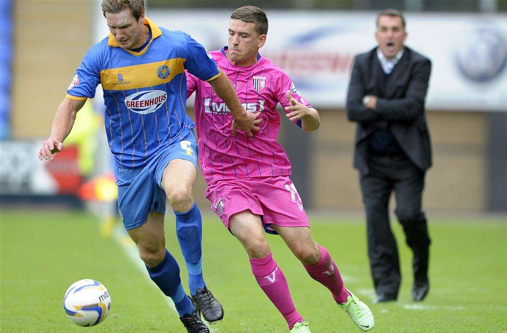 Cody McDonald is urged on by Martin Allen Picture: Barry Goodwin