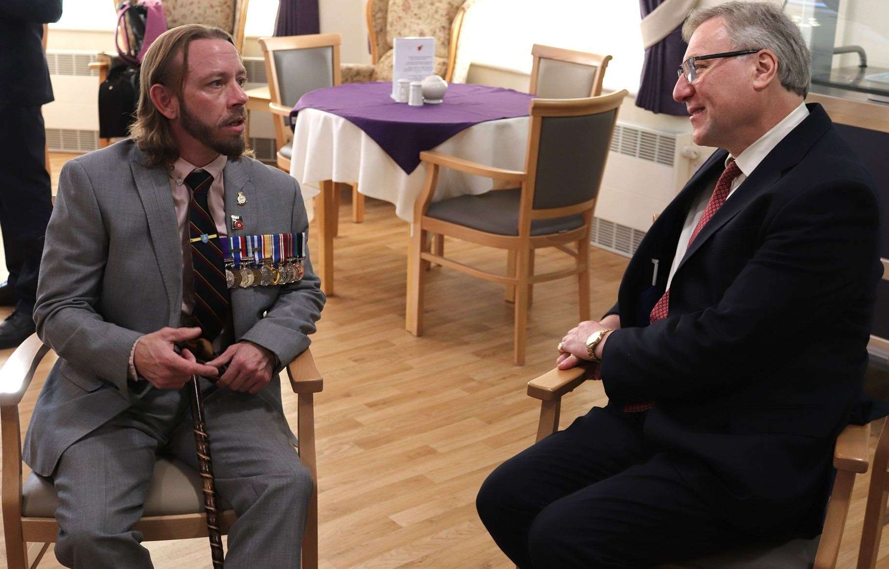 Former Royal Marine Paul Landamore with Nicholas Fisher, Chairman of Colyer-Fergusson Charitable Trust, which donated £500,000 to the RBLI