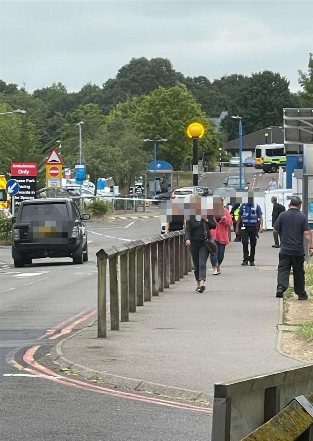 Security staff and police outside Maidstone hospital this morning. Photo: Ben Marshall