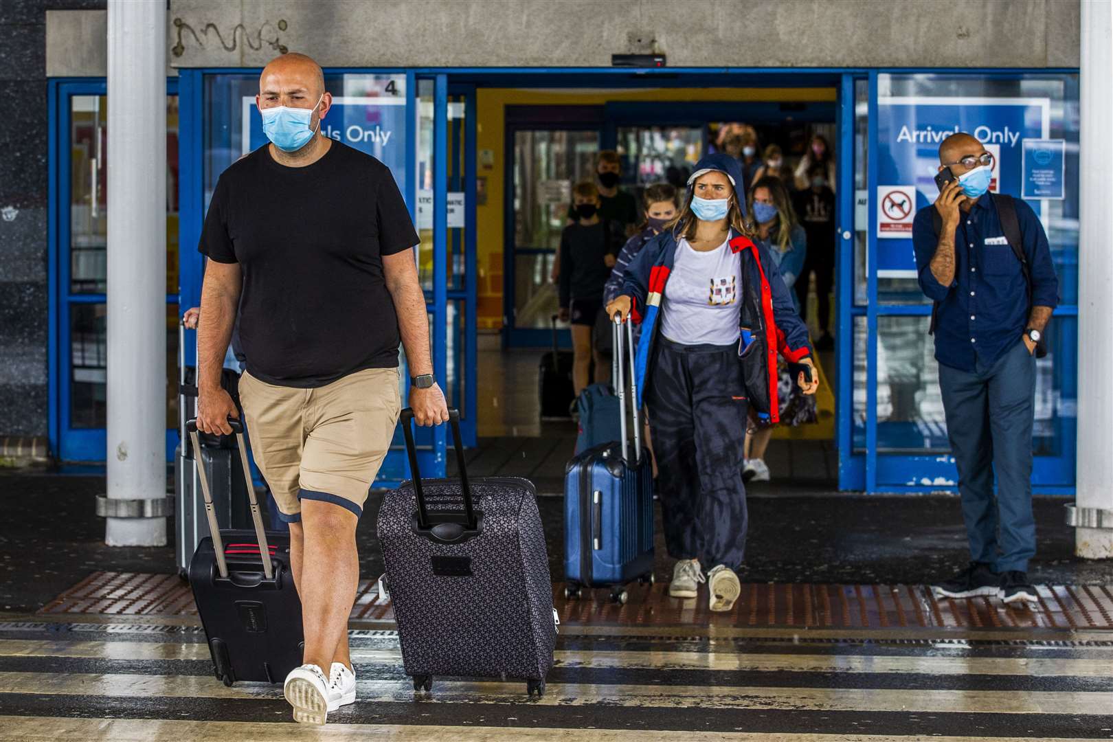 Passengers leaving Belfast International Airport (Liam McBurney/PA)